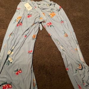 Sheer floral pants with belt